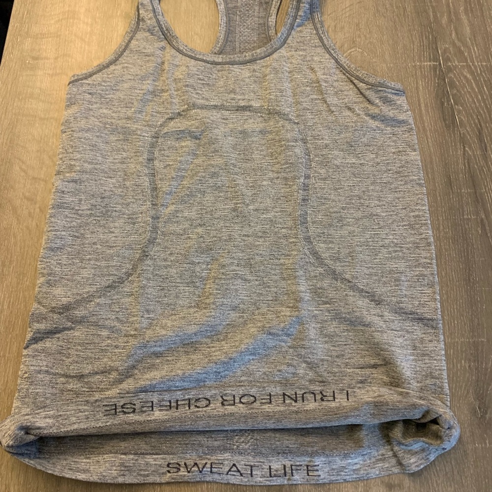 EUC Lululemon Swiftly Tech Racerback Silver Size 8